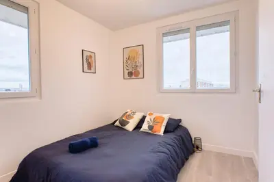 Un ou plusieurs lits dans un hébergement de l'établissement Balcon cosy