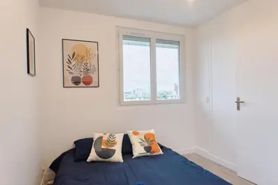 Un ou plusieurs lits dans un hébergement de l'établissement Balcon cosy