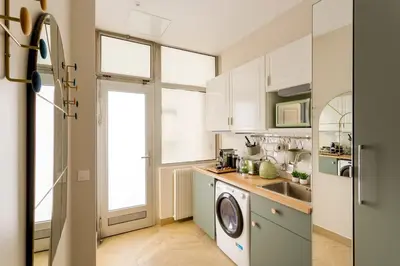 Cuisine ou kitchenette dans l'établissement Les Jardins de Basfroi