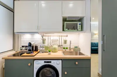Cuisine ou kitchenette dans l'établissement Les Jardins de Basfroi