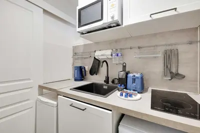Cuisine ou kitchenette dans l'établissement Appartement charmant pour 2, Batignolles
