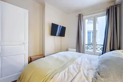 Un ou plusieurs lits dans un hébergement de l'établissement Cocon familial près des Buttes-Chaumont