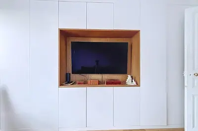 Télévision ou salle de divertissement dans l'établissement Cocon familial près des Buttes-Chaumont