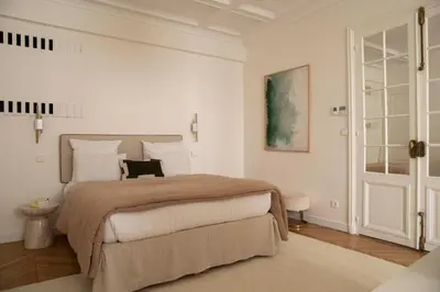 Un ou plusieurs lits dans un hébergement de l'établissement Maison V - Saint-Germain Luxury Residence