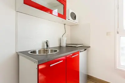 Cuisine ou kitchenette dans l'établissement Cosy studio - 2P - Malakoff Hauts-de-Seine