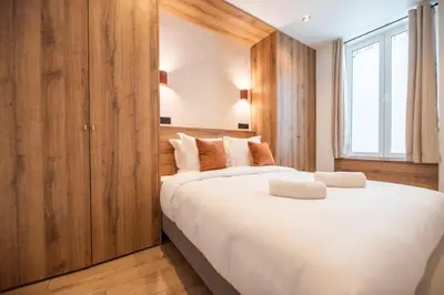 Un ou plusieurs lits dans un hébergement de l'établissement Elegant Flat near République & Canal Saint Martin