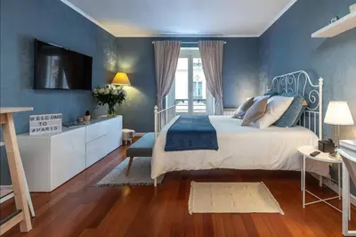 Un ou plusieurs lits dans un hébergement de l'établissement MIKE STAY Luxury Suite Ponthieu - Champs-Élysées