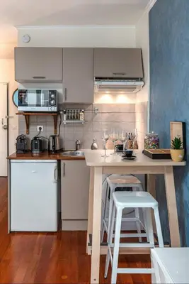 Cuisine ou kitchenette dans l'établissement MIKE STAY Luxury Suite Ponthieu - Champs-Élysées