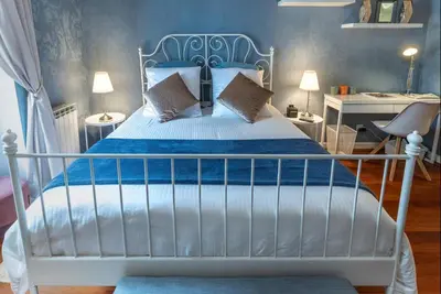Un ou plusieurs lits dans un hébergement de l'établissement MIKE STAY Luxury Suite Ponthieu - Champs-Élysées
