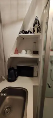 Salle de bains dans l'établissement Chambre au pied de la Tour Eiffel