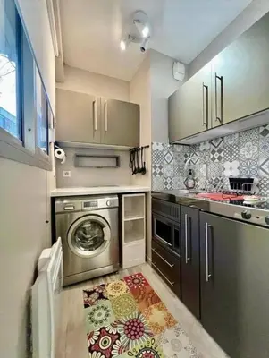 Cuisine ou kitchenette dans l'établissement Elegant studio near transport and terrace
