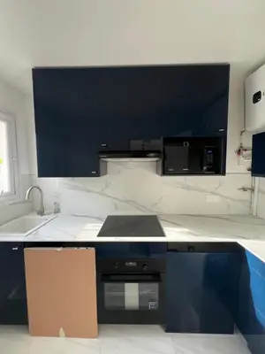 Cuisine ou kitchenette dans l'établissement Appartement Paris 19