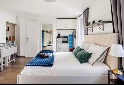 Un ou plusieurs lits dans un hébergement de l'établissement Studio type chambre d'hôtel - Proche Gare de Lyon