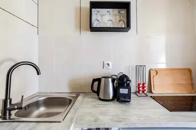 Cuisine ou kitchenette dans l'établissement Studio type chambre d'hôtel - Proche Gare de Lyon