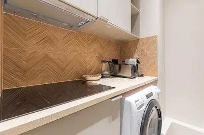Cuisine ou kitchenette dans l'établissement Charming 1BR air-conditioned - Close to Trocadéro