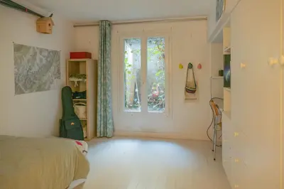 Un ou plusieurs lits dans un hébergement de l'établissement House in Paris
