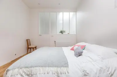 Un ou plusieurs lits dans un hébergement de l'établissement House in Paris