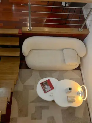 Coin salon dans l'établissement Le Loft Mont-Cenis
