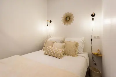 Un ou plusieurs lits dans un hébergement de l'établissement Cosy flat 3P- Le Marais 2