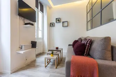 Coin salon dans l'établissement Cosy flat 3P- Le Marais 2