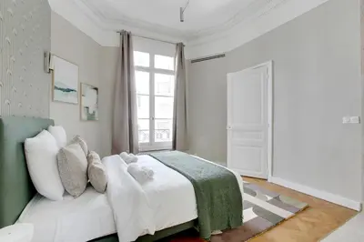 Un ou plusieurs lits dans un hébergement de l'établissement Beautiful AC apartment - Close to Trocadéro