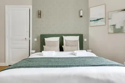 Un ou plusieurs lits dans un hébergement de l'établissement Beautiful AC apartment - Close to Trocadéro