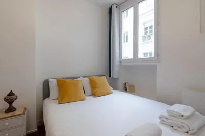 Un ou plusieurs lits dans un hébergement de l'établissement Sophisticated 2BR - Steps to Station