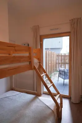 Un ou plusieurs lits dans un hébergement de l'établissement Apartement with garden and parking 5 min to métro line 4