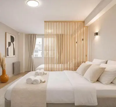 Un ou plusieurs lits dans un hébergement de l'établissement Montmartre - Deluxe studio with lift for 4
