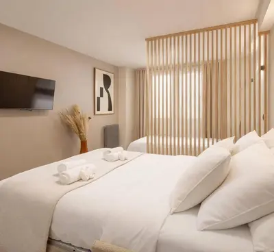 Un ou plusieurs lits dans un hébergement de l'établissement Montmartre - Deluxe studio with lift for 4