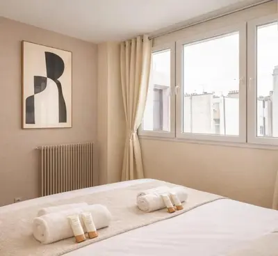Un ou plusieurs lits dans un hébergement de l'établissement Montmartre - Deluxe studio with lift for 4