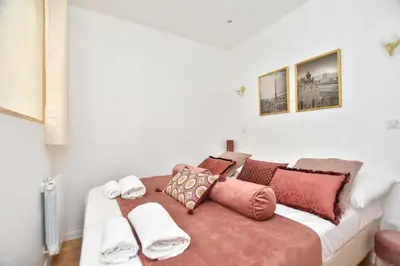 Un ou plusieurs lits dans un hébergement de l'établissement Amazing apartment - Le Marais