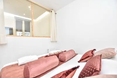 Coin salon dans l'établissement Amazing apartment - Le Marais
