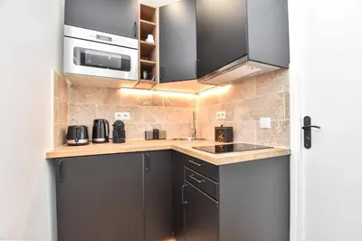Cuisine ou kitchenette dans l'établissement Amazing apartment - Le Marais