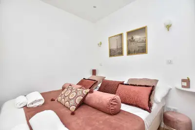 Un ou plusieurs lits dans un hébergement de l'établissement Amazing apartment - Le Marais