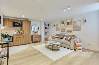 Cuisine ou kitchenette dans l'établissement Superb AC apartment Paris Center Bourse Place
