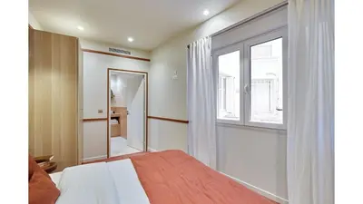 Un ou plusieurs lits dans un hébergement de l'établissement Residence Sébastopol - Paris