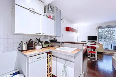 Cuisine ou kitchenette dans l'établissement Studio 30 m avec balcon proche Roland Garros