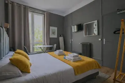Un ou plusieurs lits dans un hébergement de l'établissement Charming Studio - 2P - Near Gare de l'Est