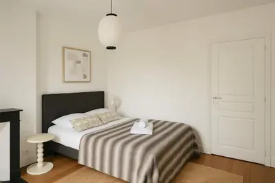 Un ou plusieurs lits dans un hébergement de l'établissement Charmant appartement Paris 12 pour 4 personnes