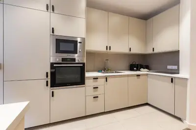Cuisine ou kitchenette dans l'établissement Charming - Air-conditioned and Terrace