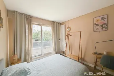 Un ou plusieurs lits dans un hébergement de l'établissement Idéal studio dans Paris 05ème