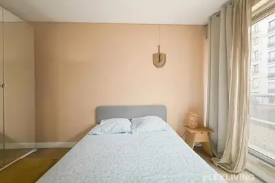 Un ou plusieurs lits dans un hébergement de l'établissement Idéal studio dans Paris 05ème