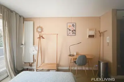 Un ou plusieurs lits dans un hébergement de l'établissement Idéal studio dans Paris 05ème
