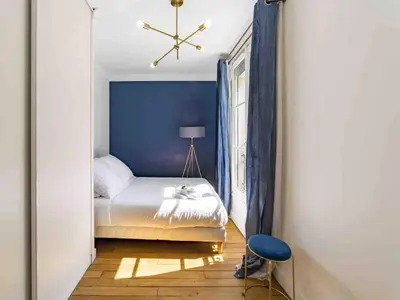Un ou plusieurs lits dans un hébergement de l'établissement Effeil Tower Luxury Apartment Trocadéro -2 bedrooms