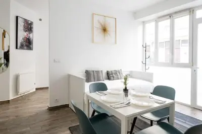 Coin salon dans l'établissement Bel appartement parisien