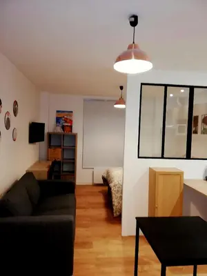 Coin salon dans l'établissement Cosy Montmartre Apartment
