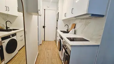 Cuisine ou kitchenette dans l'établissement Nice apt quiet comfortable and warm