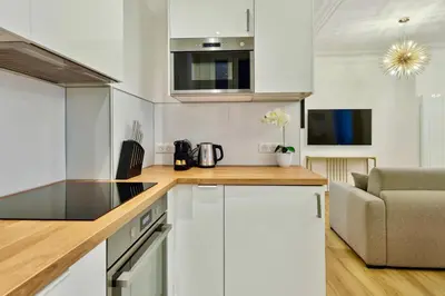 Cuisine ou kitchenette dans l'établissement Stylish loft - Arc de Triomphe