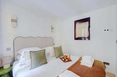 Un ou plusieurs lits dans un hébergement de l'établissement Amazing apartment - Saint Germain des Pres